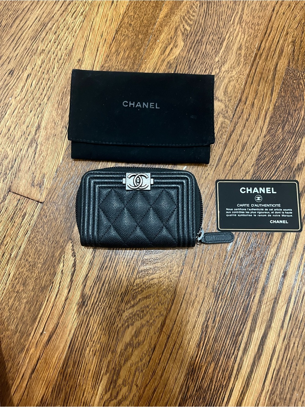Authentic CHANEL Quilted Black Leather Zip Card Holder with CC Logo
In caviar